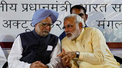 Mr Singh with Mr Modi in the western city of Ahmedabad in 2013, when Mr Modi was Gujarat's chief minister and prime ministerial candidate for the Bharatiya Janata Party. Reuters
