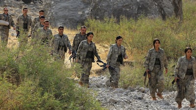 PKK fighters arrive for a disarmament ceremony in the Qandil mountains of Iraq on October 26. Reuters