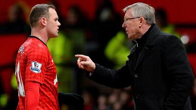 Sir Alex Ferguson, right, is likely to lift the lid on his often stormy relationship with Wayne Rooney, left, in his new autobiography. Andrew Yates /AFP