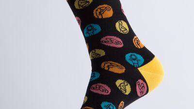 The Prayer sock: “We transformed the polka-dot pattern by inserting prayer positions in each dot. This design is in keeping with our Unity collection, as the essence of prayer is to connect with a higher power.”