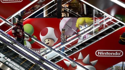 An advert of the Nintendo videogame maker at an electronic retailer in Tokyo, Japan. The Japanese company has reported a quarterly loss. Thomas Peter / Reuters