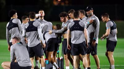 The Liverpool squad take a drinks break. Reuters