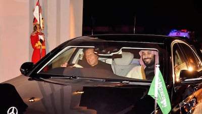 Imran Khan drives Mohammed bin Salman to their engagement. Pakistan is the Saudi crown prince's first stop on an Asian tour Reuters