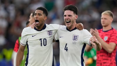 England's Jude Bellingham and Declan Rice celebrate at the end of their 2-1 last-16 extra-time victory against Slovakia at Euro 2024 in Gelsenkirchen on June 30, 2024. AP