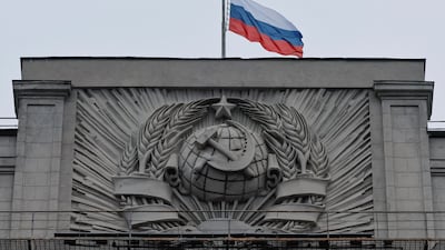 The Russian national flag is lowered at the headquarters of State Duma, the lower house of parliament. Reuters