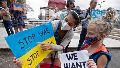 Ukrainian citizens in San Jose, Costa Rica, protest against the Russian invasion in Ukraine on March 4. Ezequiel Becerra / AFP