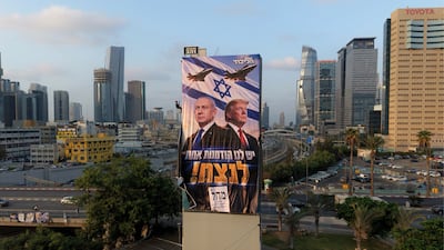 Rappelling workers hang a large-scale Likud Party election billboard reading 'We have one chance to win!' and featuring Israeli Prime Minister Benjamin Netanyahu (L) with US President Donald Trump and fighter jets, in Tel Aviv, Israel, 25 October 2026. Israel will hold its national legislative election to choose the 120 members of the 26th Knesset on 27 October 2026. EPA / ABIR SULTAN