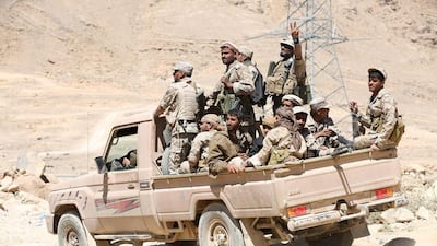 Pro-government Yemeni soldiers ride on the back of a truck in the liberated area of Fardhat Nahm, around 60 kilometres from the capital, Sanaa, on February 20, 2016. Ali Owidha/Reuters