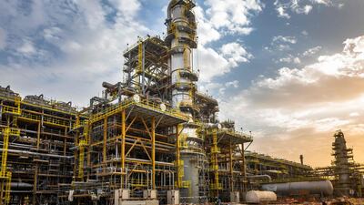 A Saudi Aramco gas plant near Jubail. Taqa, Jera, and Saudi Aramco JV will construct a power plant for Amiral petrochemical complex, supplying electricity and steam by 2027. AFP