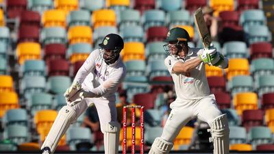 Australia captain Tim Paine helped steady the innings after the loss of two quick wickets against India on Day 1 at The Gabba. Getty Images