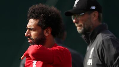 Liverpool manager Jurgen Klopp and Mohamed Salah during training. Reuters