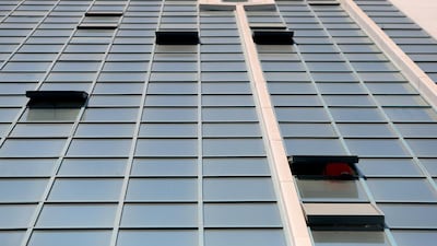 Windows in a few buildings in the capital lack safety locks to protect against children falling. Ravindranath K / The National