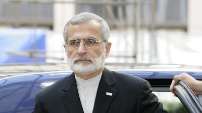 Iran's foreign minister Kamal Kharazi arrives at the EU headquarters in Brussels in 2005 for an international conference on Iraq. Gerard Cerles / AFP
