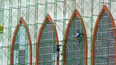 Authorities are planning to build a huge Islamic centre that will contain a mosque, a hotel and a study centre, and specially trained tour guides will point Muslim visitors in the direction of the nearest mosque at prayer time. Sonny Tumbelaka/AFP Photo