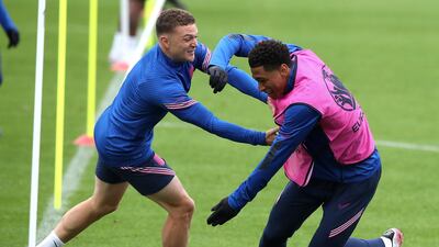 England's Kieran Trippier, left, and Jude Bellingham