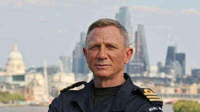 James Bond star Daniel Craig receives an honorary Royal Navy rank of Commander in London. Photo: AP