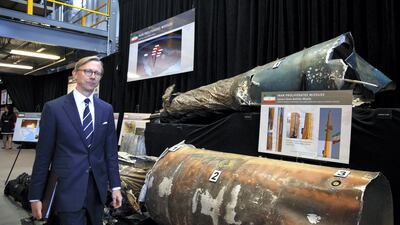 Brian Hook, US special representative for Iran, walks past parts of short-range ballistic missiles at the Iranian Materiel Display at an airbase near Washington on November 29, 2018. AP Photo