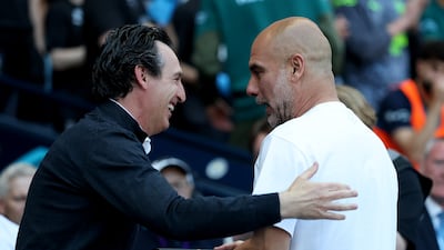 Pep Guardiola interacts with Aston Villa manager Unai Emery. Getty Images