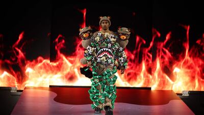 A model presents a creation in the Sprayground spring/summer 2026 catwalk show at London Fashion Week. AFP