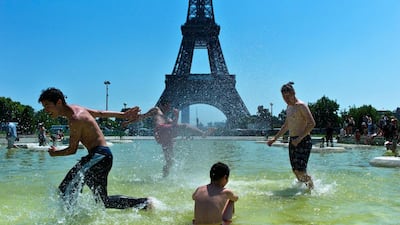 The Trocadero Gardens fountains offered some respite from extreme temperatures in Paris, France, last month as a mass of hot air moved north from Africa to Europe, pushing up the mercury. Thibault Camus / AP Photo