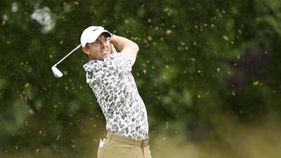 Rory McIlroy plays his shot from the sixth tee at The Country Club. AFP