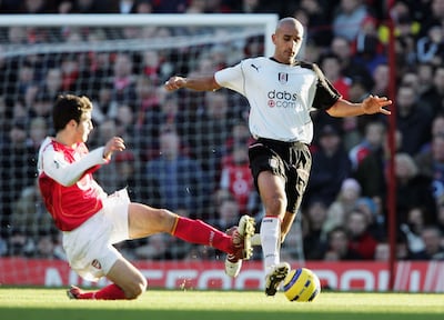Zesh Rehman, right, playing for Fulham against Arsenal in 2004. Getty