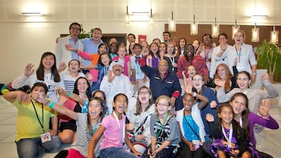 Children who sang for the charity song Tomorrow/Bokra, with Quincy Jones, centre right, and Badr Jafar, centre left, and Ali F Mostafa, top left. Courtesy Clint McLean / FIFF