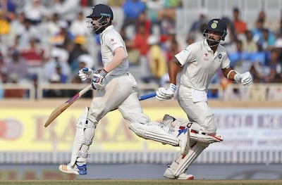 Lokesh Rahul, left, and Murali Vijay struggled in the first two Tests of the ongoing series in Australia. Aijaz Rahi / AP Photo