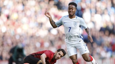 Turkey’s Hakan Calhanoglu in action with England’s Raheem Sterling. Action Images via Reuters / Carl Recine