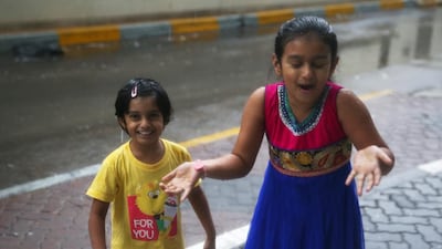While the rain and winds caused major damage they brought smiles of glee for some of the younger residents of Abu Dhabi. Delores Johnson / The National