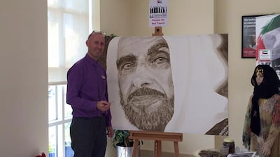 Adrian Lloyd with his portrait of Sheikh Zayed. Courtesy Adrian Lloyd