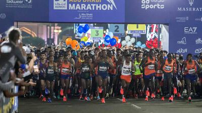 Participants at the start of the race at the Adnoc Abu Dhabi Marathon. Leslie Pableo for The National