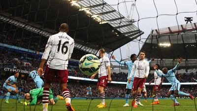 Fernandinho of Manchester City scores his team's third, winning goal past Brad Guzan of Aston Villa during City's 3-2 Premier League victory on Saturday at the Etihad Stadium. Alex Livesey / Getty Images