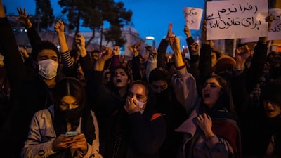 Demonstrators chant while gathering during a vigil for the victims of the Ukraine International Airlines flight that was shot down by Iran, in Tehran, Iran. Bloomberg