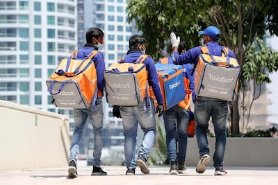 All talabat riders will have delivery boxes fitted to bikes by the end of 2021, replacing cumbersome back-pack boxes. Pawan Singh / The National