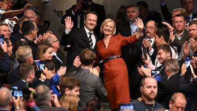 British Prime Minister Liz Truss with husband Hugh O'Leary following her keynote speech on the final day of the Conservative Party conference. Getty Images