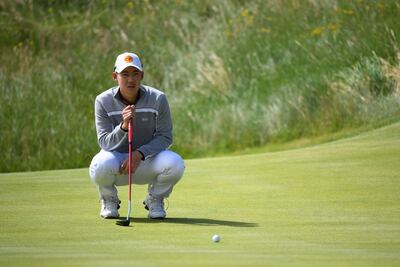 Thailand's Jazz Janewattananond putts on the 16th during his second round at The Open.