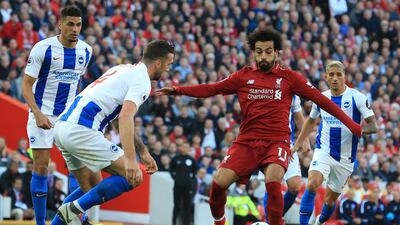 Brighton defender Shane Duffy, left, up against Liverpool goalscorer Mohamed Salah. AFP