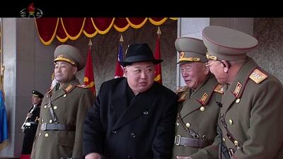 Kim Jong Un speaks with military officials during a military parade in Pyongyang. North Korea held the military parade and rally on Kim Il Sung Square on Thursday, just one day before South Korea hosts the opening ceremony of the Pyeongchang Winter Olympics. KRT / AP
