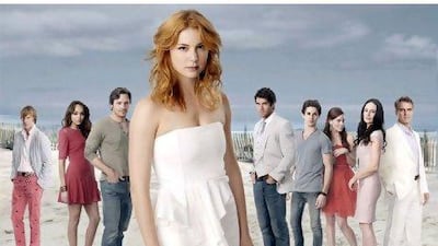 Emily VanCamp, centre, plays Emily Thorne in the ABC drama series Revenge. Courtesy ABC