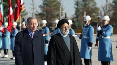 Turkish President Recep Tayyip Erdogan and his Iranian counterpart Ebrahim Raisi review a guard of honour during a welcome ceremony in Ankara. Reuters