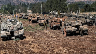 Israeli armoured vehicles massed in northern Israel on September 27. Reuters