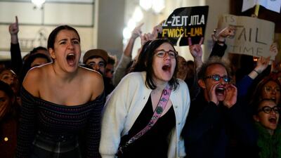 Protestors shout slogans outside Malta's prime minister's office. AP Photo