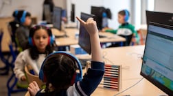 Advanced technology is not only changing how pupils learn but how staff teach. AFP