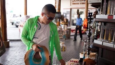 Chinese tourists shopping in Deira. Razan Alzayani / The National