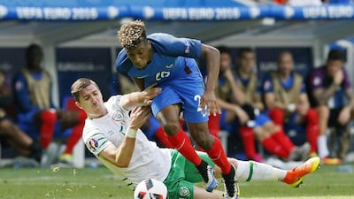 Republic of Ireland's Stephen Ward in action with France's Kingsley Coman. (REUTERS/Robert Pratta)