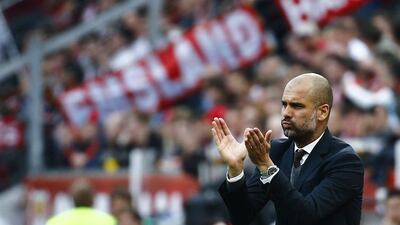 Bayern Munich manager Pep Guardiola observes his side during their Bundesliga loss to Bayer Leverkusen on Saturday. Kai Pfaffenbach / Reuters / May 2, 2015