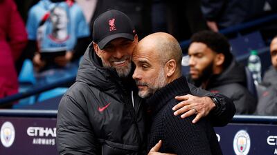 Jurgen Klopp, left, and Pep Guardiola will face each other for possibly the last time in the Premier League when Liverpool host Manchester City on Sunday. Reuters