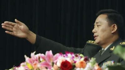 Col Huang Xueping invites questions about China's plan to send warships overseas during a press conference in Beijing, China, on Dec 23 2008.