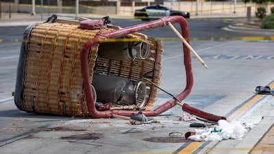 The basket of a hot air balloon which crashed lies on the pavement in Albuquerque, New Mexico. AP Photo